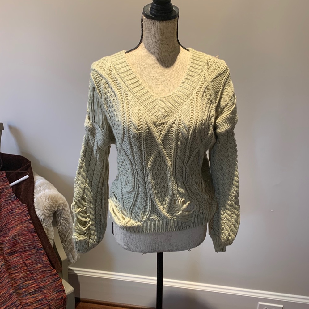 V-neck sweater.
